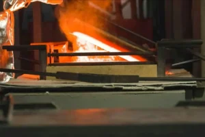 How do magnetic fields melt metal without making contact In an induction furnace